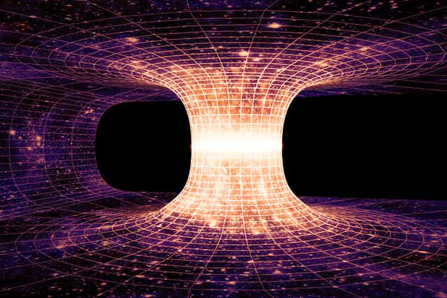 Wormholes may be lurking in the universe – and new studies are proposing  ways of finding them